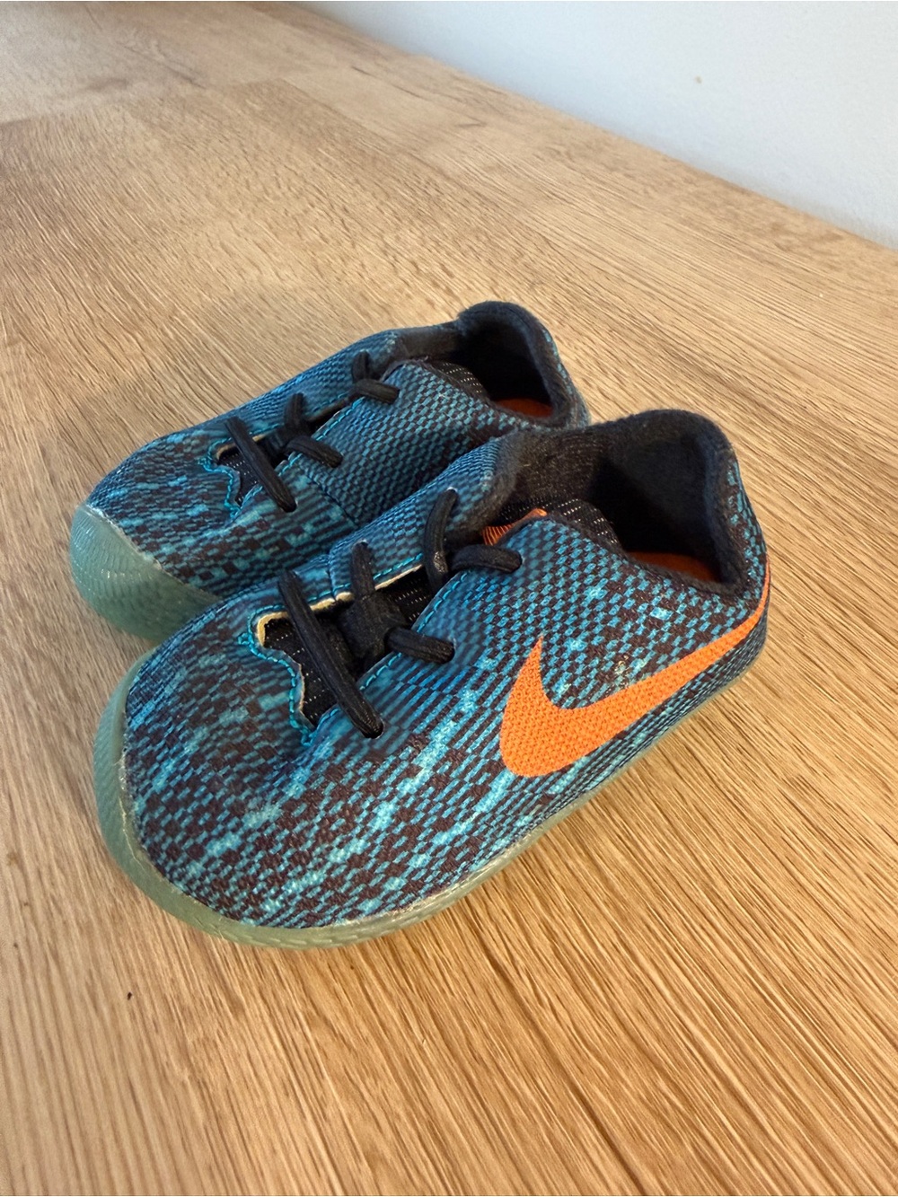 Nike Kids Slip-On Runner in Teal with Orange Swoosh